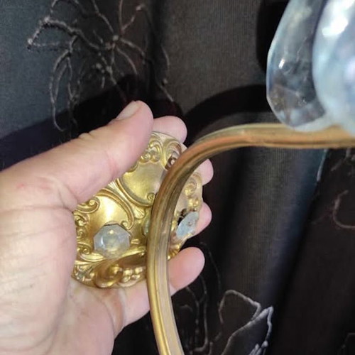 Vintage brass two-light wall sconces used with crystals