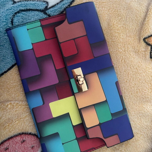 Colorful leather handheld clutch like new