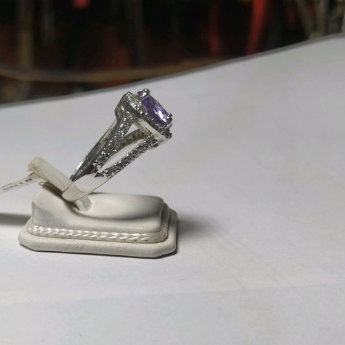 Silver (925) ring new with purple stone and smaller stones