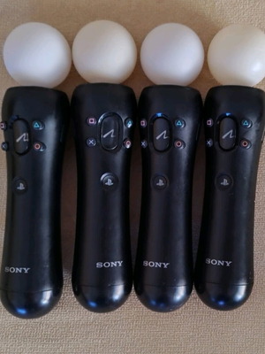Sony PS3-4 Move controllers like new with charger and gun case