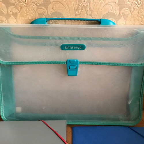 Plastic bag, thick plastic folders, cardboard folders and slides like new