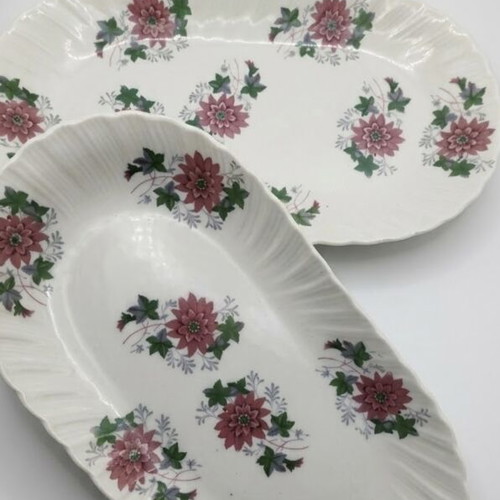 Porcelain dish set used, 2 serving plates with marks