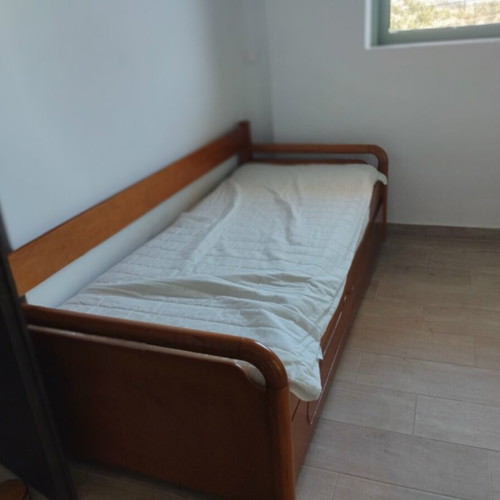 Wooden sofa bed like new with 2 mattresses and metal mechanism