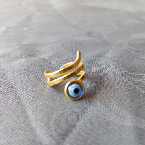 Adjustable ring with eye, gold color, like new
