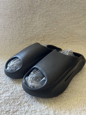 Slides new, size 38-39, black