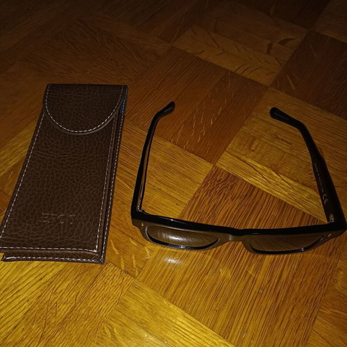 Epos sunglasses new with leather case, black lenses