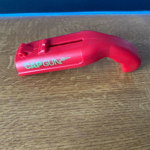 CapGun Toy like new, bottle opener that shoots the cap