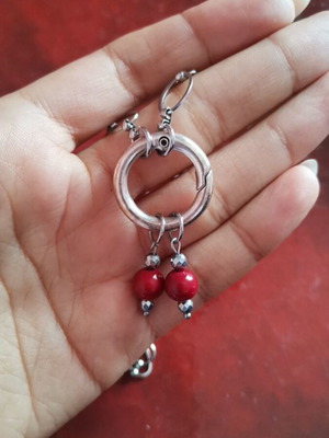 Steel necklace used, red and silver