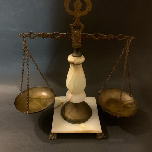 Decorative antique scale used with marble base and brass details