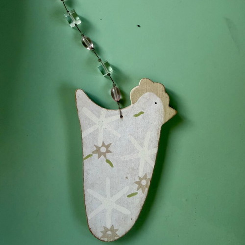Wooden hanging decoration in chicken shape