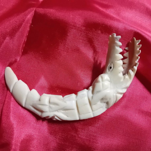 Crocodile made of camel bone used, in very good condition