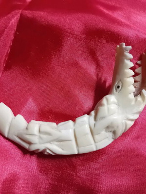 Crocodile made of camel bone used, in very good condition