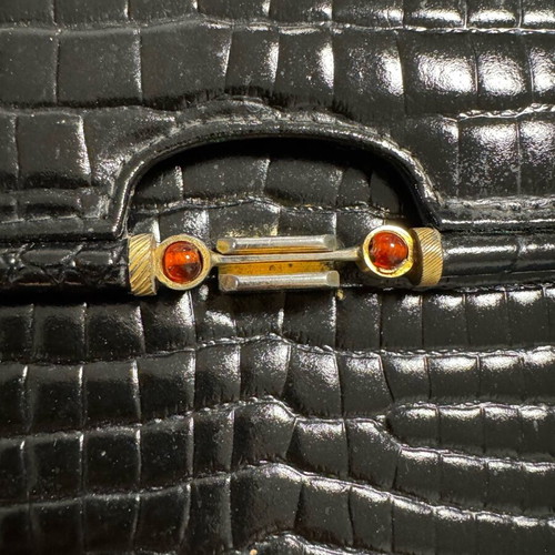 Bag with cute clasp like new, medium size, croc style, black