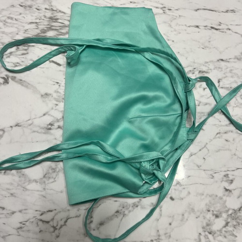 Crop Top satin mint color, new, ties at back, fits 75B and smaller