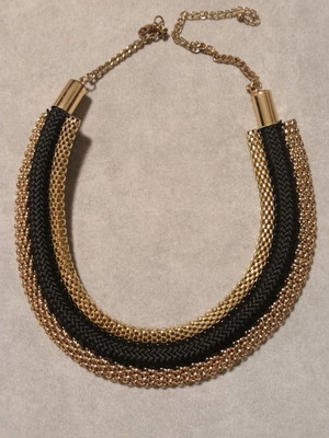 Necklace used in gold and black color
