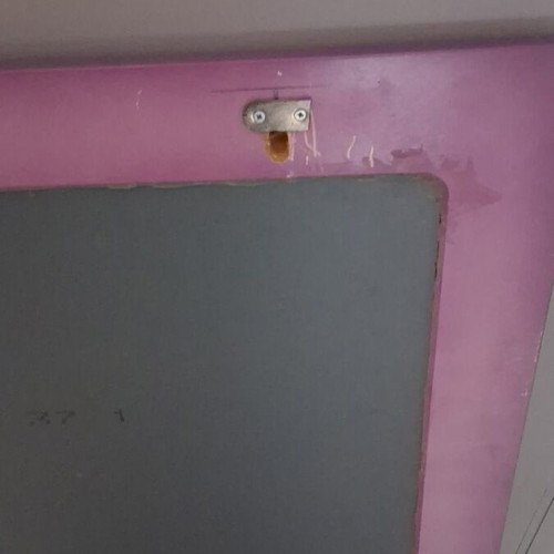 Wall mirror used, 0.96m width x 1m height, with metal clips