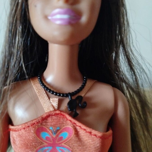 Barbie Chic Teresa doll like new, brown eyes, mini dress
