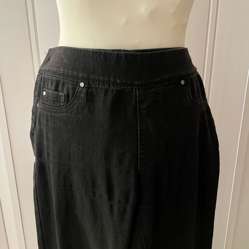 Fitted black denim pants used, elastic fabric, no zipper or buttons