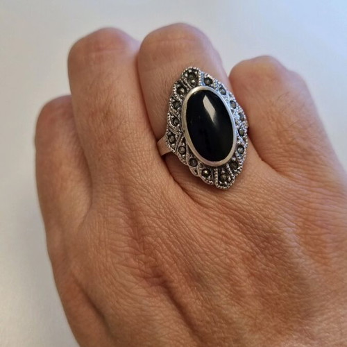 Silver ring with black stone like new, size 57