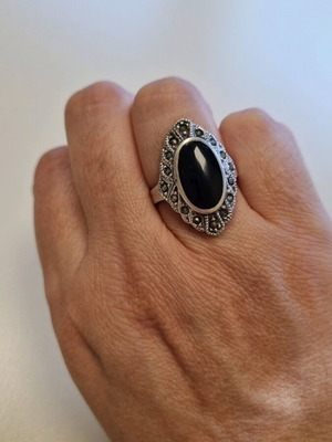 Silver ring with black stone like new, size 57