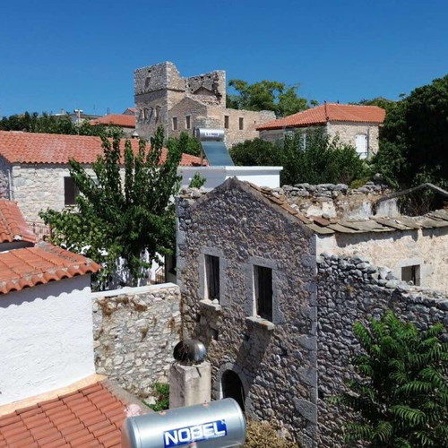 Kapetanospito building from 1876 in Areopoli Mani with sea view
