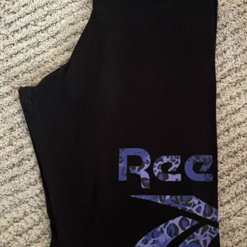 Reebok black leggings like new with purple detail