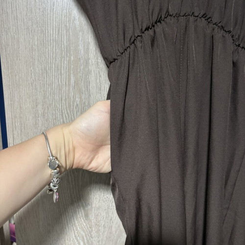Brown jumpsuit with draped sleeve, one size to large