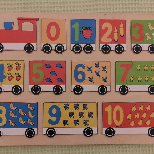 Wooden and paper puzzles used for children
