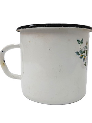 Vintage enamel metal mug with floral motif