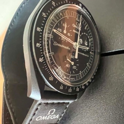 Swatch MoonSwatch Mission to the Moonphase watch, black and white