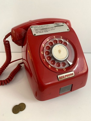 Red telephone used, coin-operated, functional with didrachmo coins