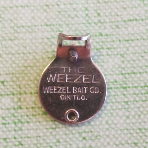 The Weezel Casting Feathered Minnow vintage fishing lure used