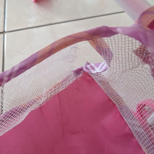 Doll stroller used with wear and fabric tears