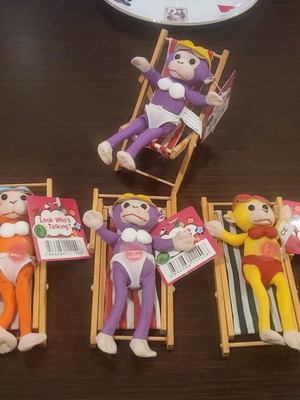 Monkey dolls in deck chair new
