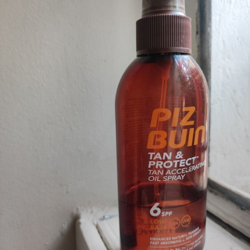 Tanning oil used with SPF 6 protection factor