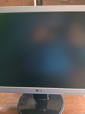 LG Flatron W1942T computer monitor used with broken stand