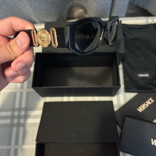 Versace sunglasses for women like new, black and gold
