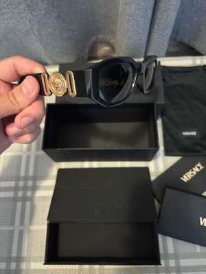 Versace sunglasses for women like new, black and gold