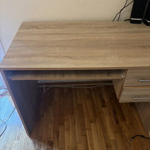 Wooden desk with sliding shelf and 2 drawers, like new