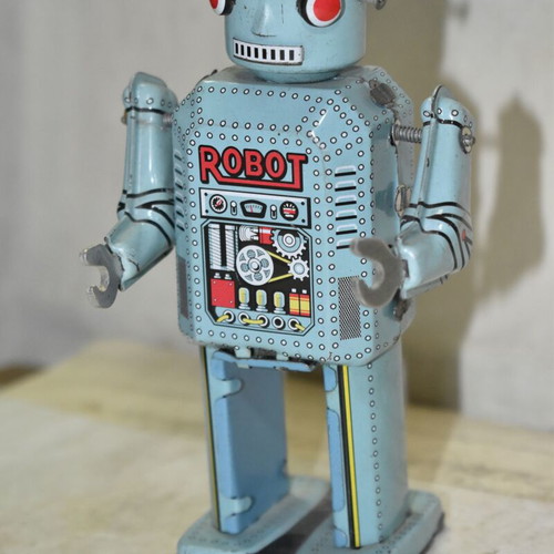 Vintage tin wind-up robot used, blue color