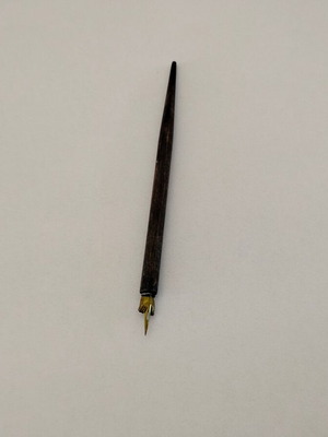 Wooden dip pen used, length 19cm