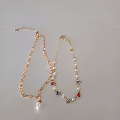 Faux bizou 2 pieces new unused