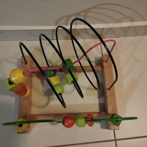 Wooden educational toy like new with wooden base