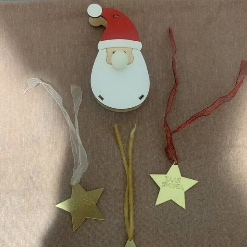 Hanging Santa Claus and 3 decorative stars, new