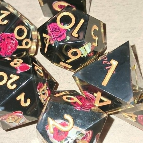 Black D&D dice set with red rose design