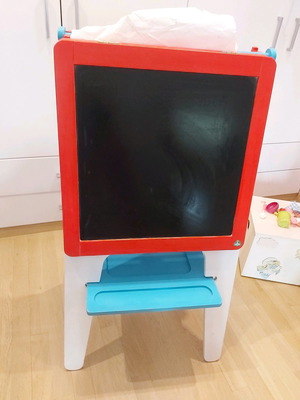 Double-sided magnetic chalk and marker board used