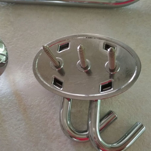 Bathroom accessory set like new with light, paper holder, and double hooks