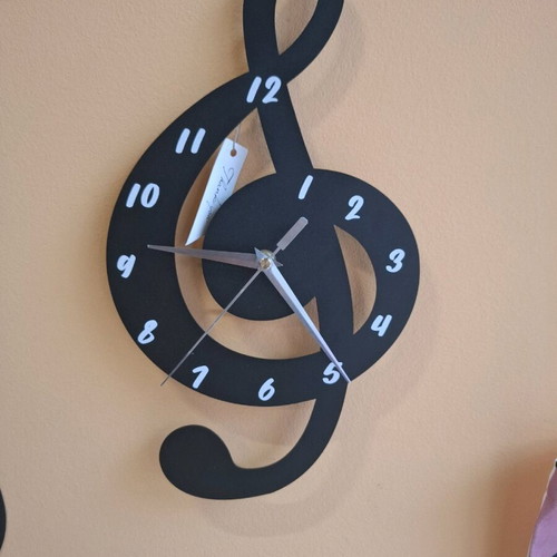 Metal wall clock new, silent operation 35x20 cm
