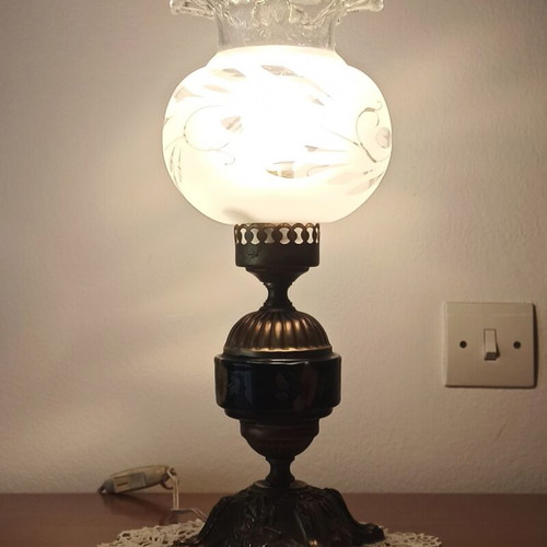Vintage table lamp with glass shade and decorative metal base used