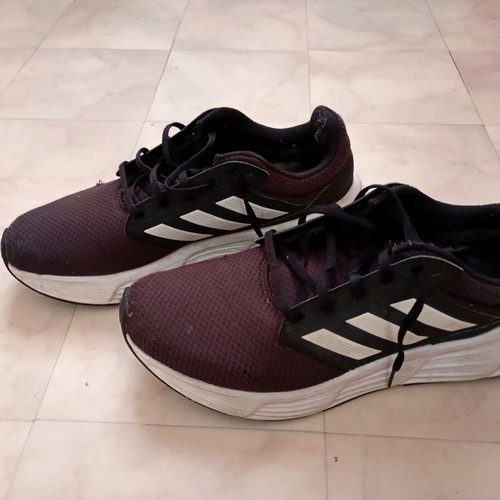 Adidas athletic shoes pair, black, size 45